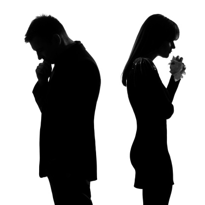 one sad couple man thinking and woman crying